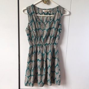 Green girls dress with leaf print